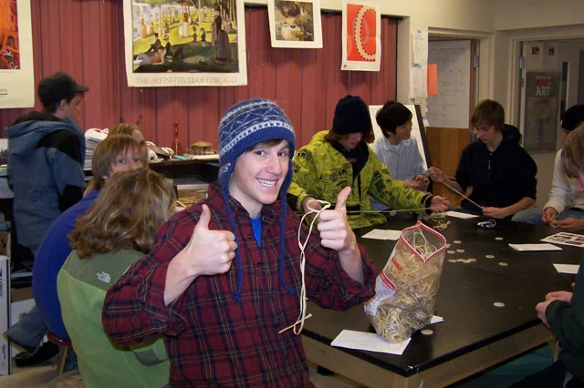 kid giving two thumbs up